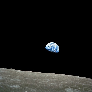 Taken by Apollo 8 crewmember Bill Anders on December 24, 1968, showing the Earth seemingly rising above the lunar surface.